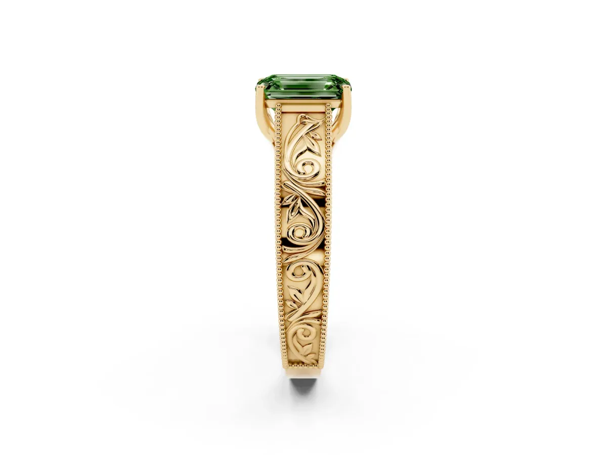 Fancy Green Emerald Cut Diamond Solitaire Ring with Engraved Band and Four-Prong Setting Yellow gold