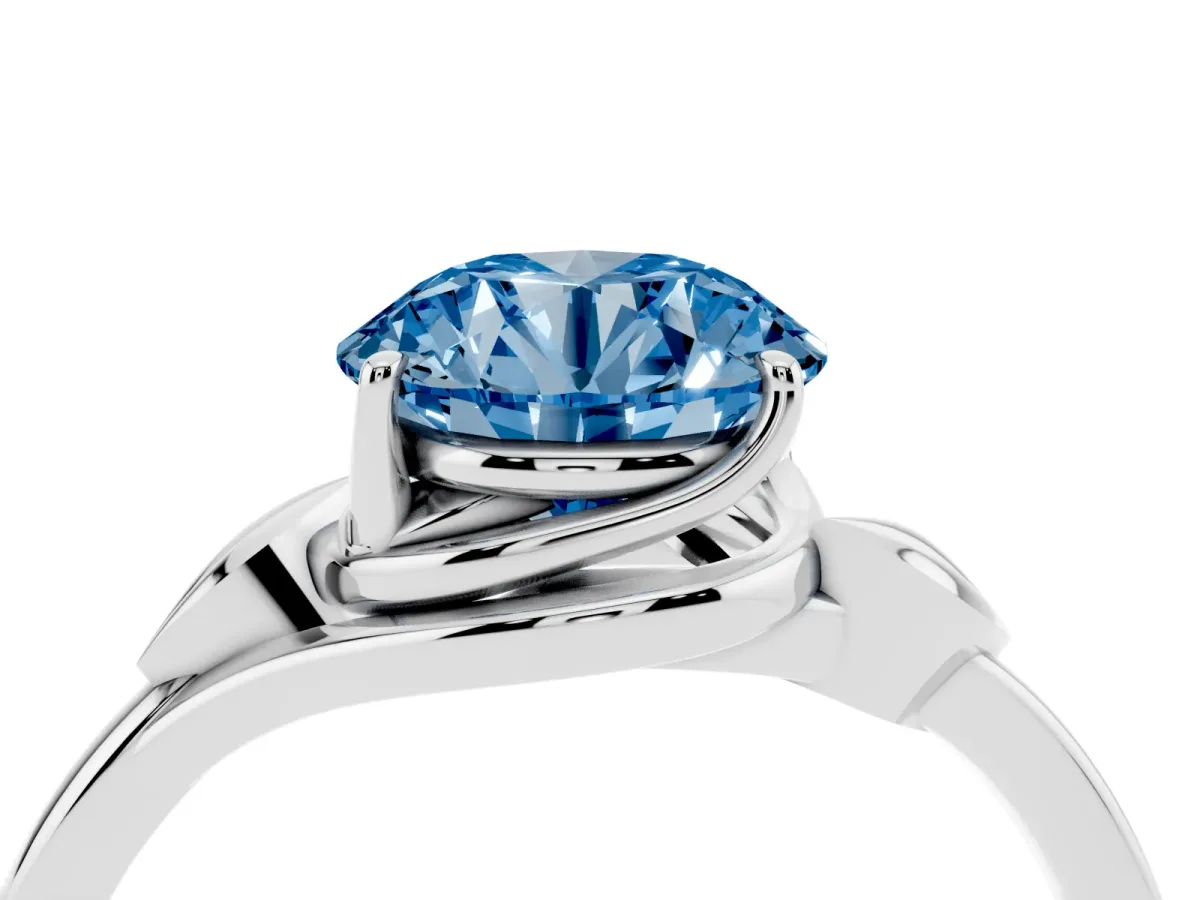Fancy Blue Round Cut Diamond Solitaire Ring with Twist Band and Four-Prong Setting Silver