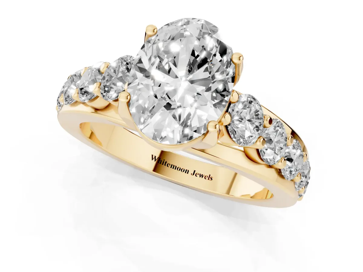 Oval Cut Diamond Engagement Ring with Pavé Band and Four-Prong Setting Yellow gold