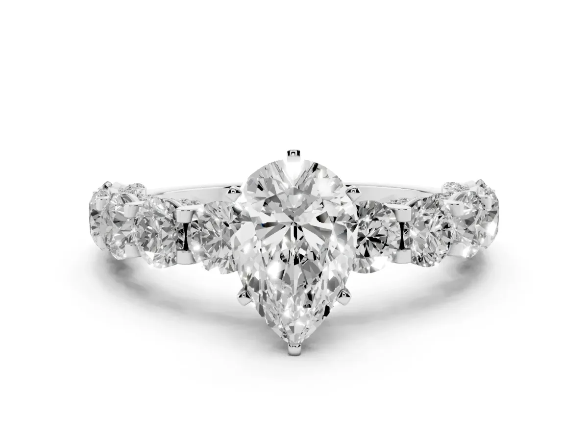 Pear Cut Diamond Side Stone Engagement Ring with Four-Prong Setting Silver