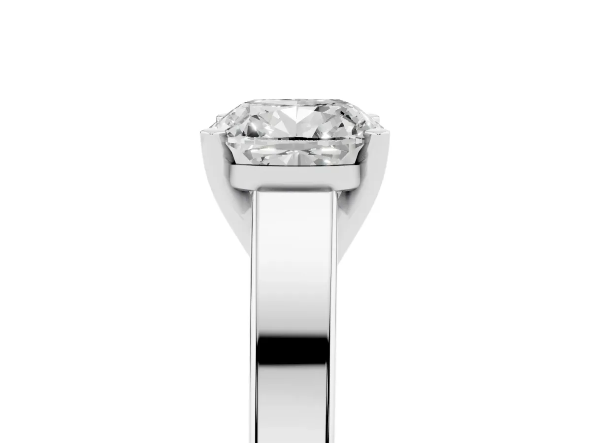 Cushion Cut Solitaire Engagement Ring with Four-Prong Setting and Tapered Band Platinum