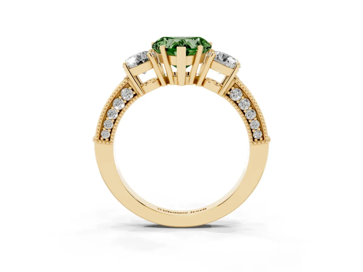Fancy Green Heart Cut Three-Stone Diamond Ring with Pavé Band and Four-Prong Setting Yellow gold