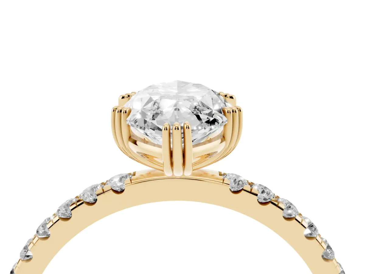 Marquise Cut Brilliant Solitaire with Pavé Band and Claw Prong Setting Yellow gold