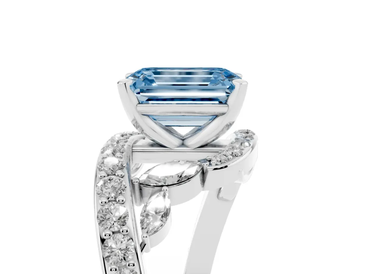 Fancy Blue Emerald Cut Solitaire with Pavé Twist Band and Four-Prong Setting Silver