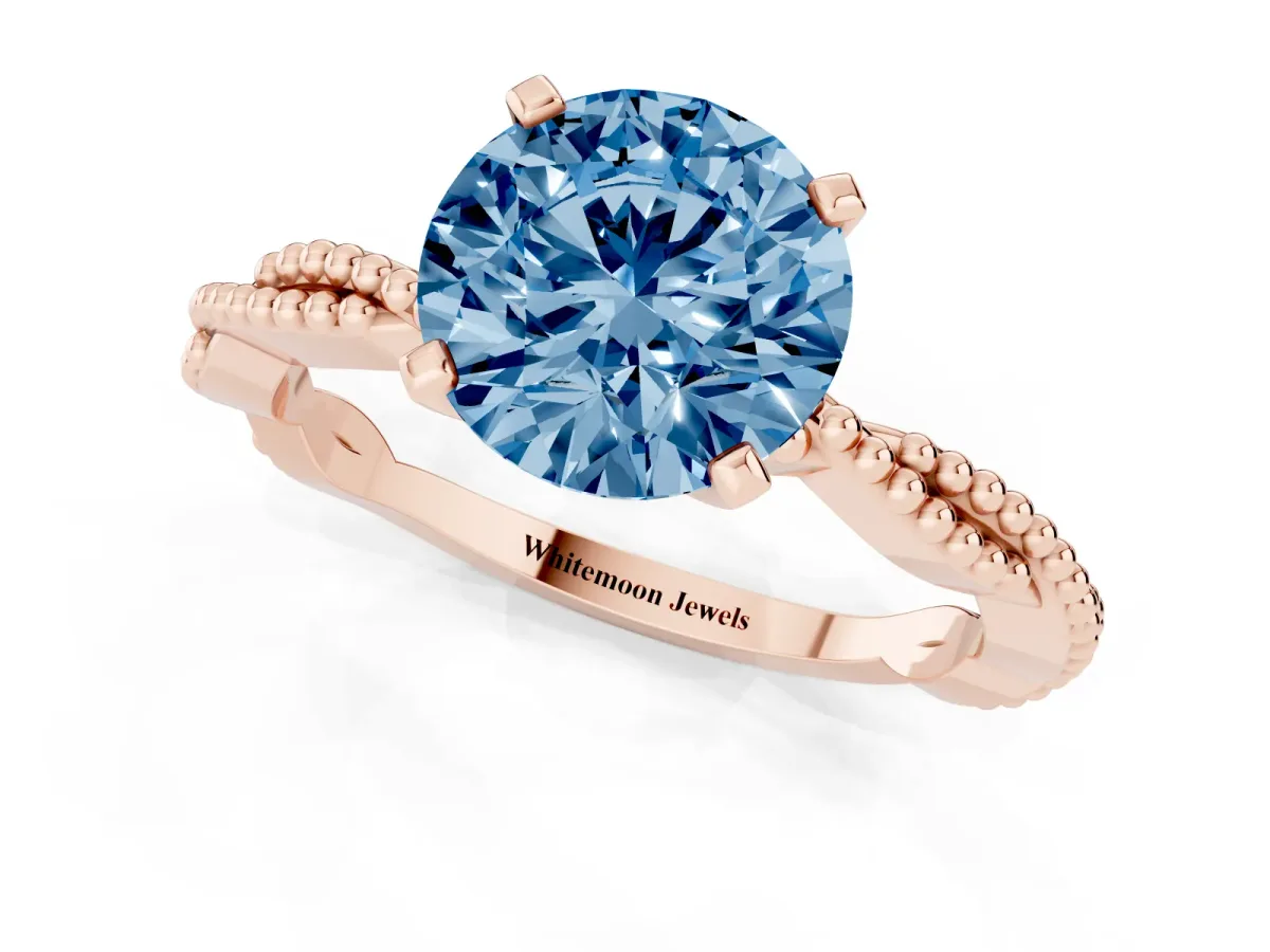 Fancy Blue Round Cut Solitaire Twisted Band with Bead Prong Setting Rose gold