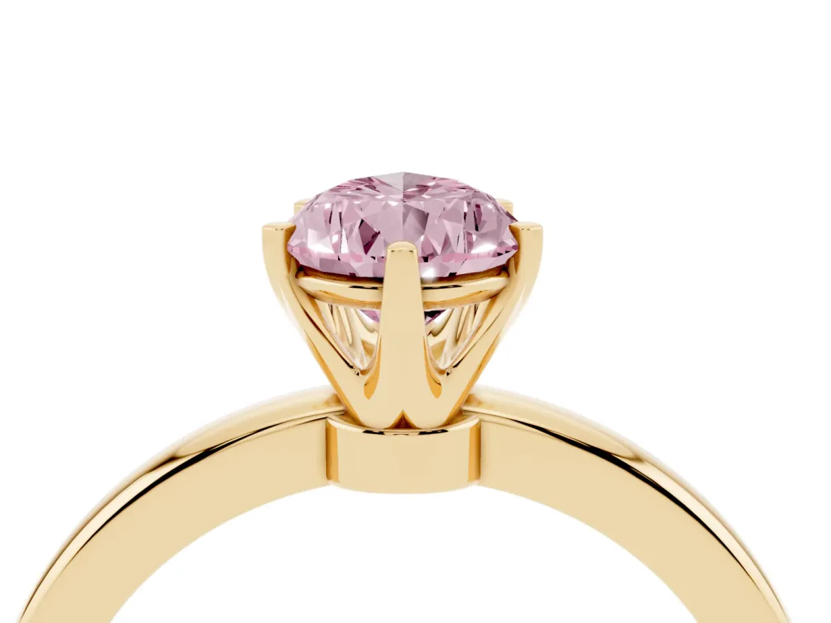 Fancy Pink Pear Cut Solitaire Diamond Ring with Six-Prong Setting on a Classic Band Yellow gold