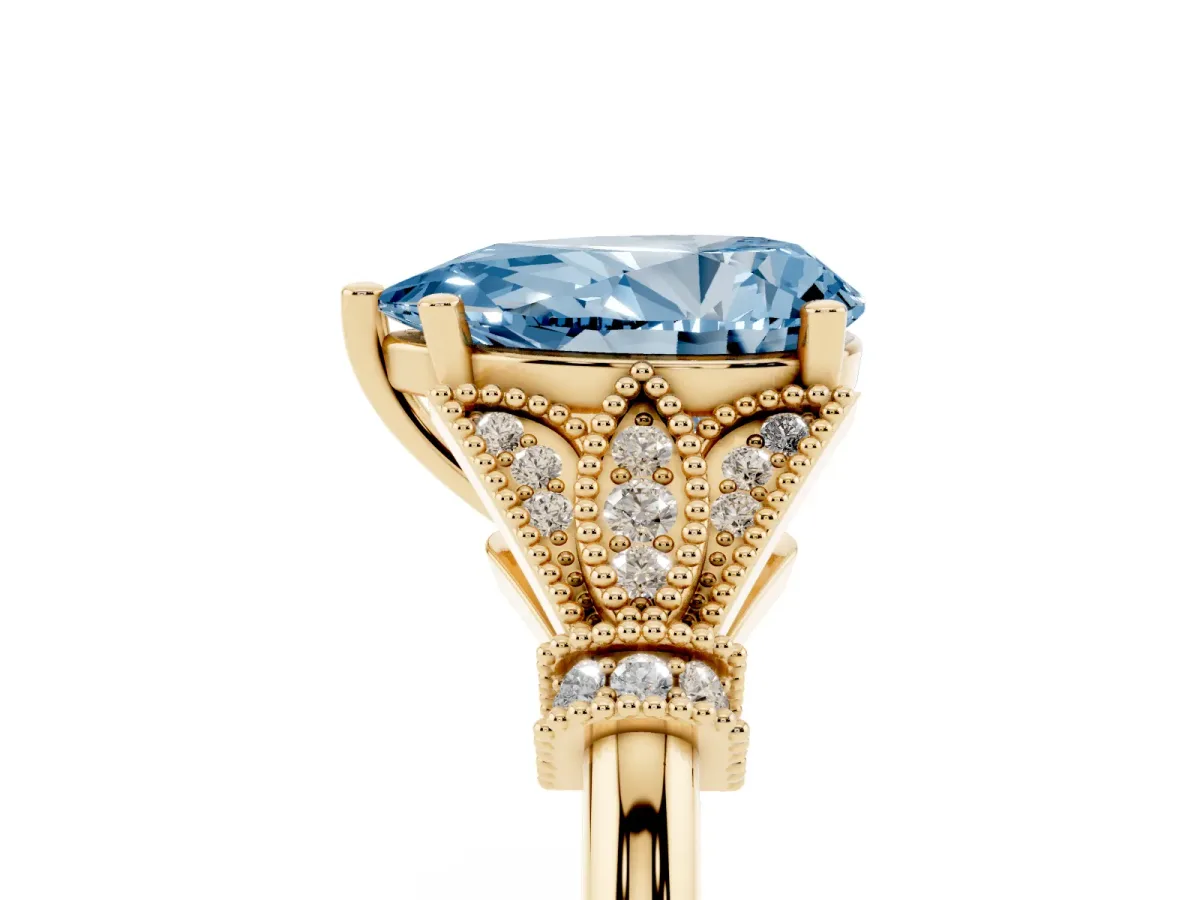 Fancy Blue Pear Cut Diamond Solitaire Ring with Floral Filigree and Pave Accents Yellow gold