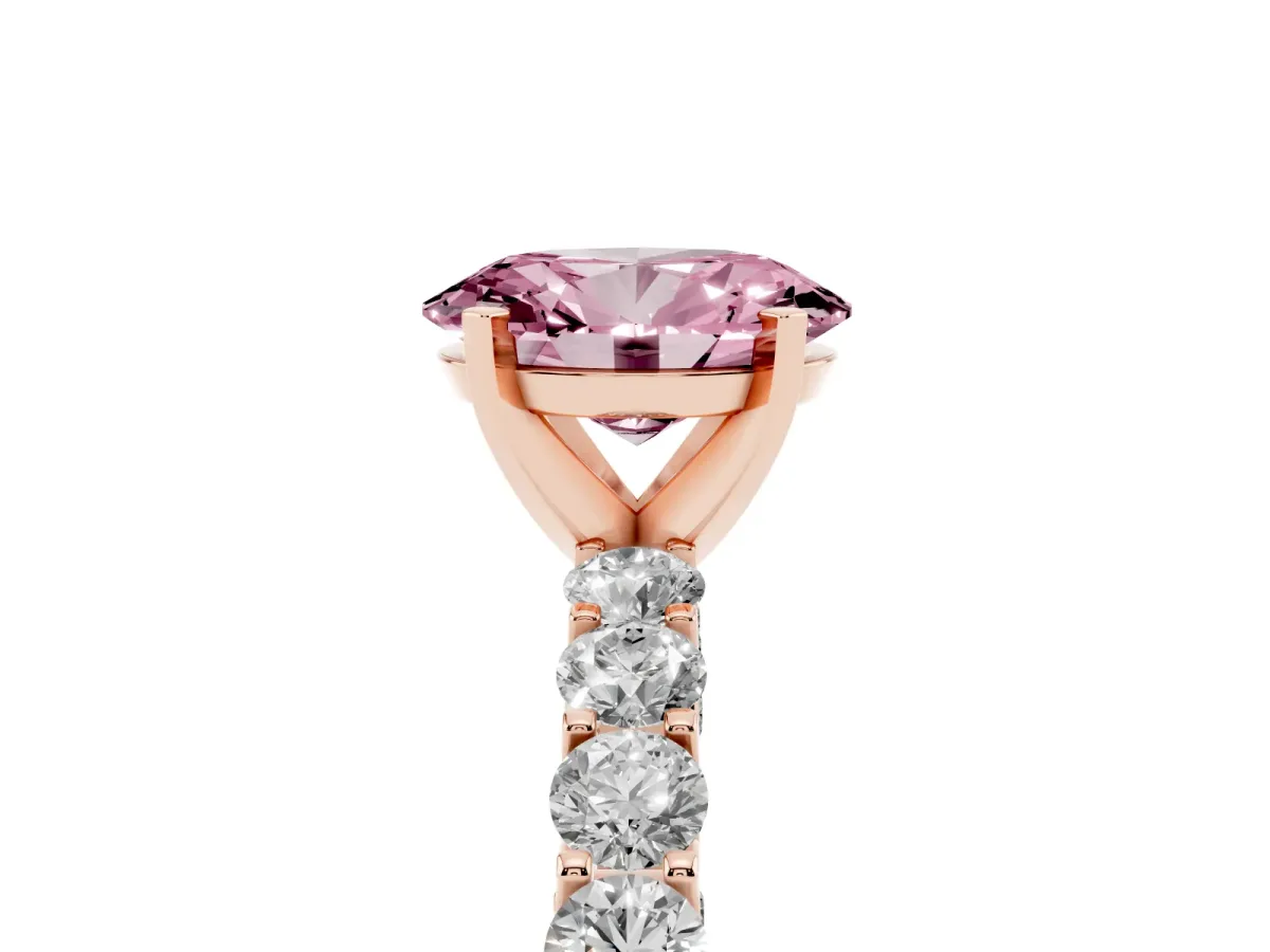 Fancy Pink Oval Cut Diamond Solitaire Ring with Shared Prong Pavé Band and Four-Prong Setting Rose gold