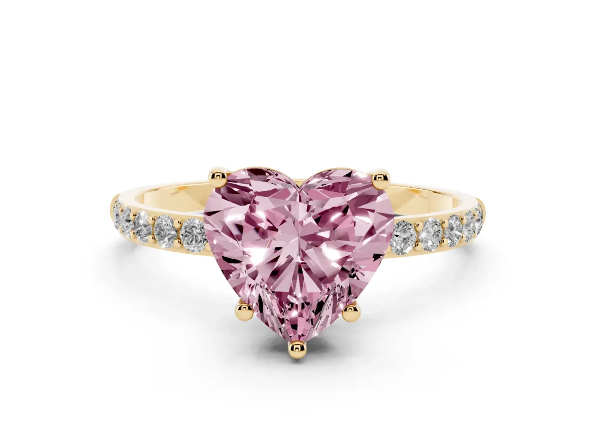 Fancy Pink Heart Cut Diamond Solitaire Ring with Round Pavé Shoulders and Prong Setting Yellow gold