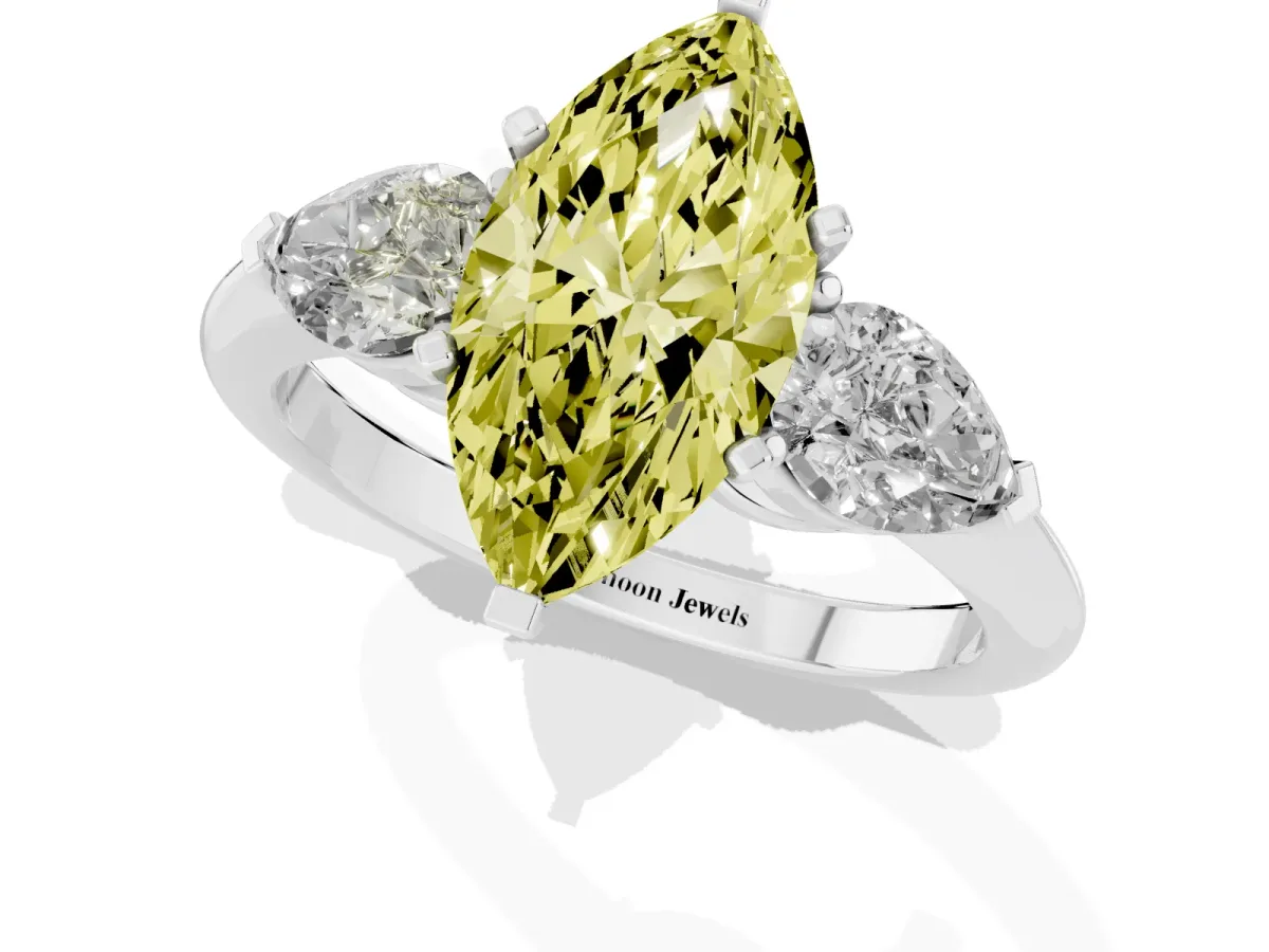 Fancy Yellow Three-Stone Marquise Cut Diamond Ring with Pear Side Stones and Four-Prong Setting Platinum