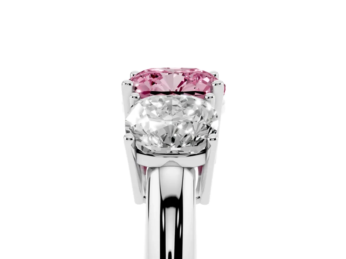 Fancy Pink Three-Stone Cushion Cut Cut Diamond Engagement Ring with Prong Setting on a White Gold Band Platinum