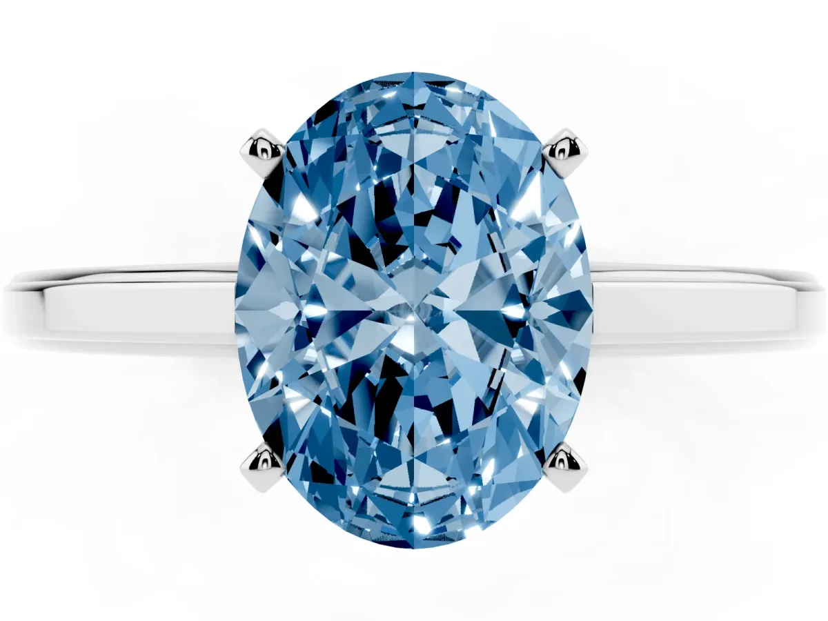 Fancy Blue Oval Cut Solitaire Diamond Ring with Four-Prong Setting and Classic Band White gold