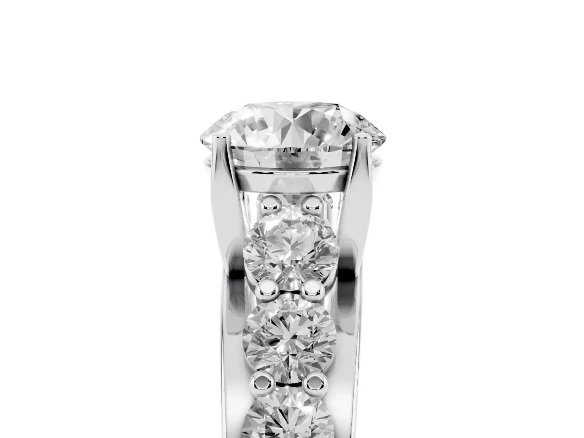 Round Cut Diamond Engagement Ring with Pavé Band and Four-Prong Setting Silver