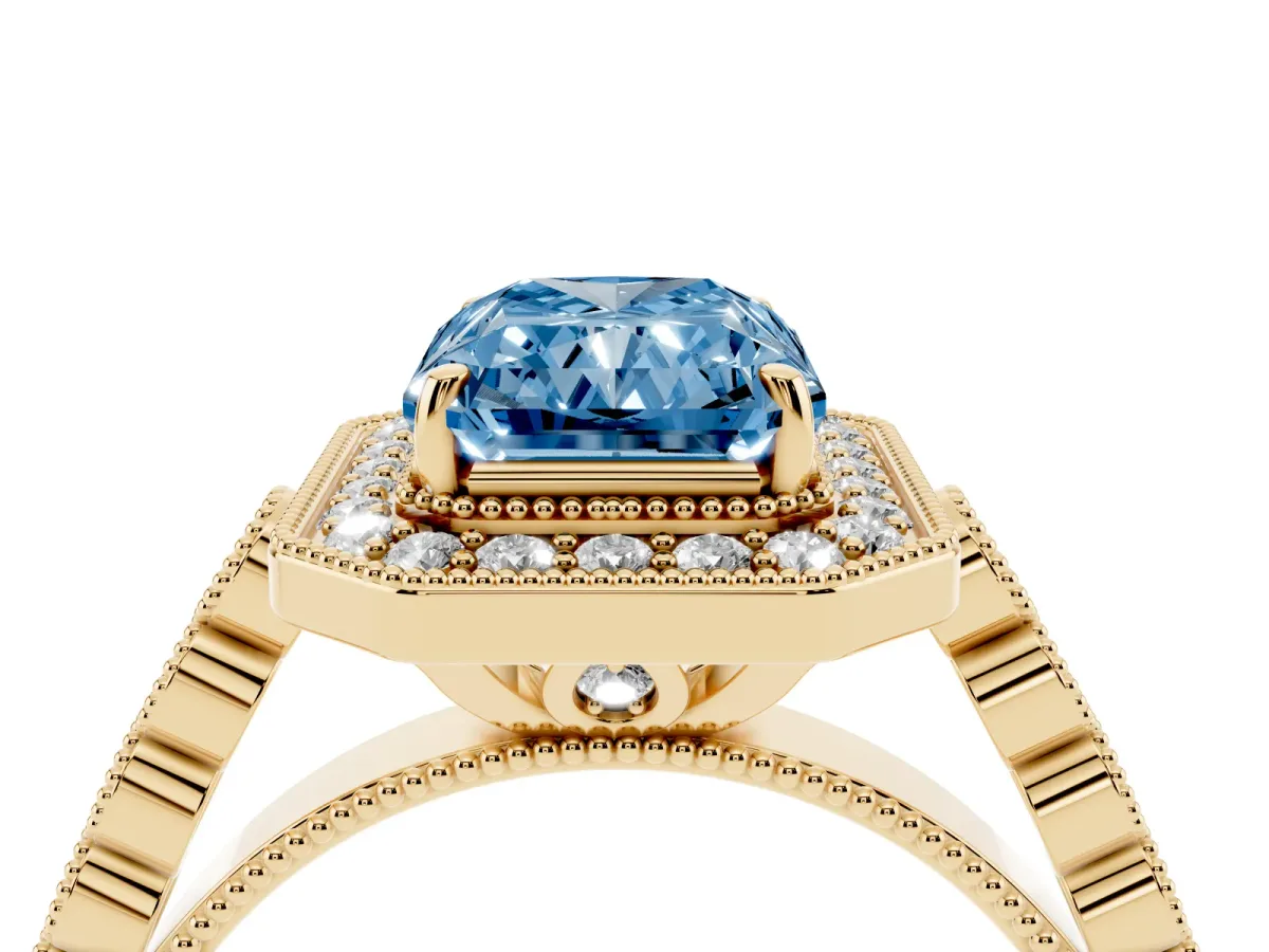 Fancy Blue Radiant Cut Halo Milgrain Solitaire with Bezel Set Side Stones and Pave Band Yellow gold