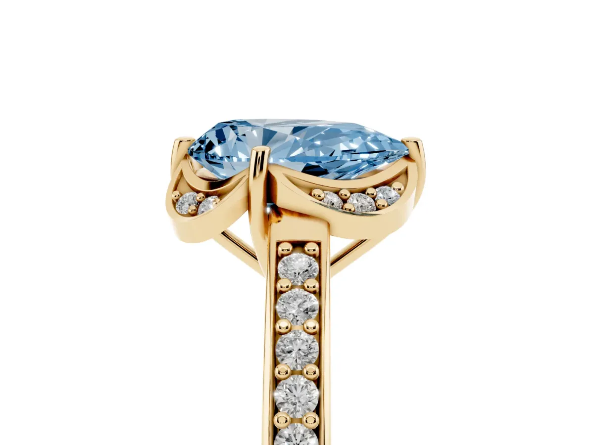 Fancy Blue Pear Cut Cut Halo Diamond Ring with Channel Set Band and Four-Prong Setting Yellow gold