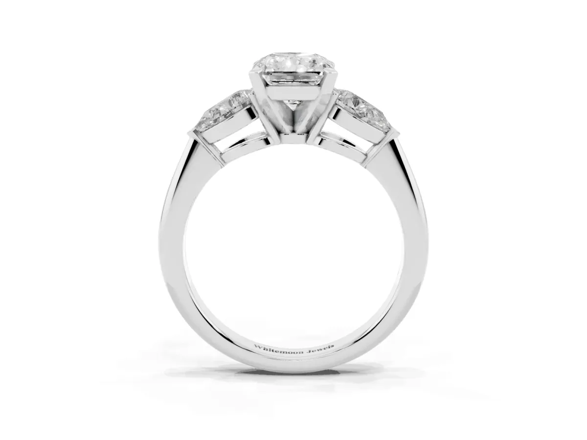 Three-Stone Radiant Cut Diamond Ring with Pear Side Stones and Four-Prong Setting Platinum