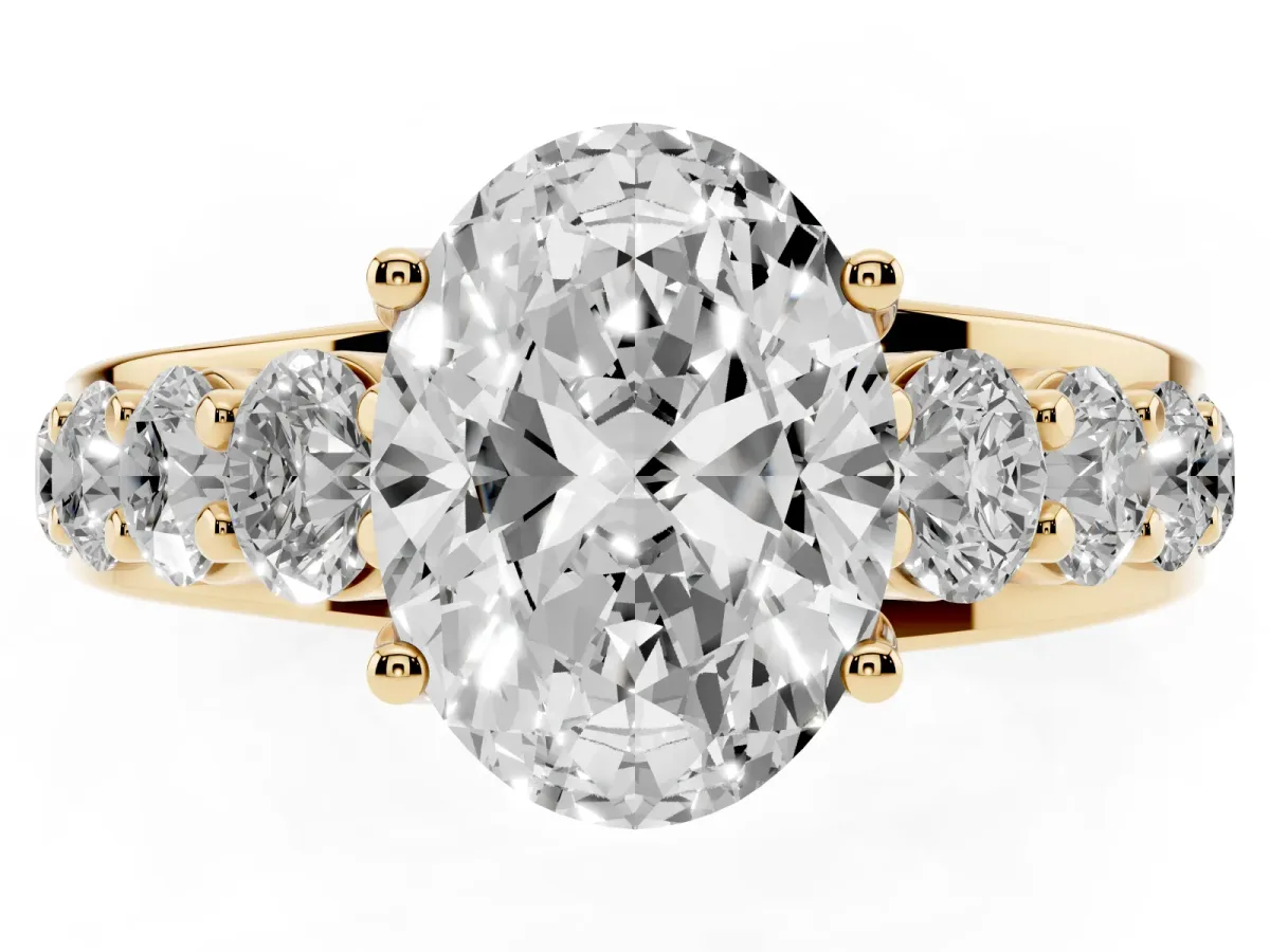 Oval Cut Diamond Engagement Ring with Pavé Band and Four-Prong Setting Yellow gold