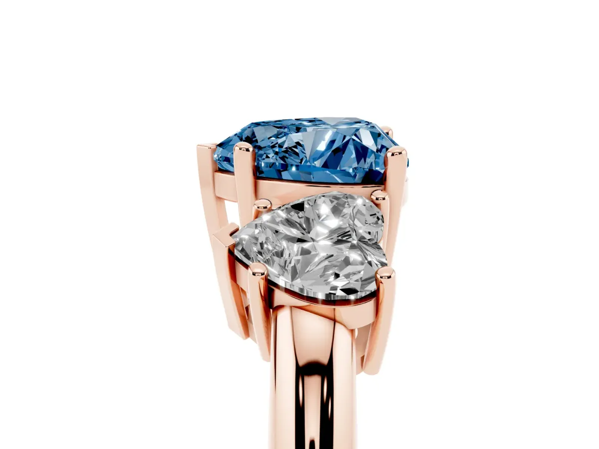 Fancy Blue Three-Stone Heart Cut Cut Diamond Engagement Ring with Prong Setting on a White Gold Band Rose gold