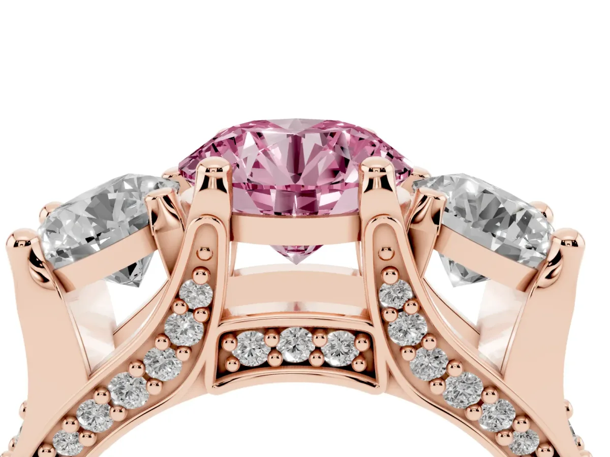Fancy Pink Round Cut Diamond Three-Stone Ring with Channel Set Band and Four-Prong Setting Rose gold
