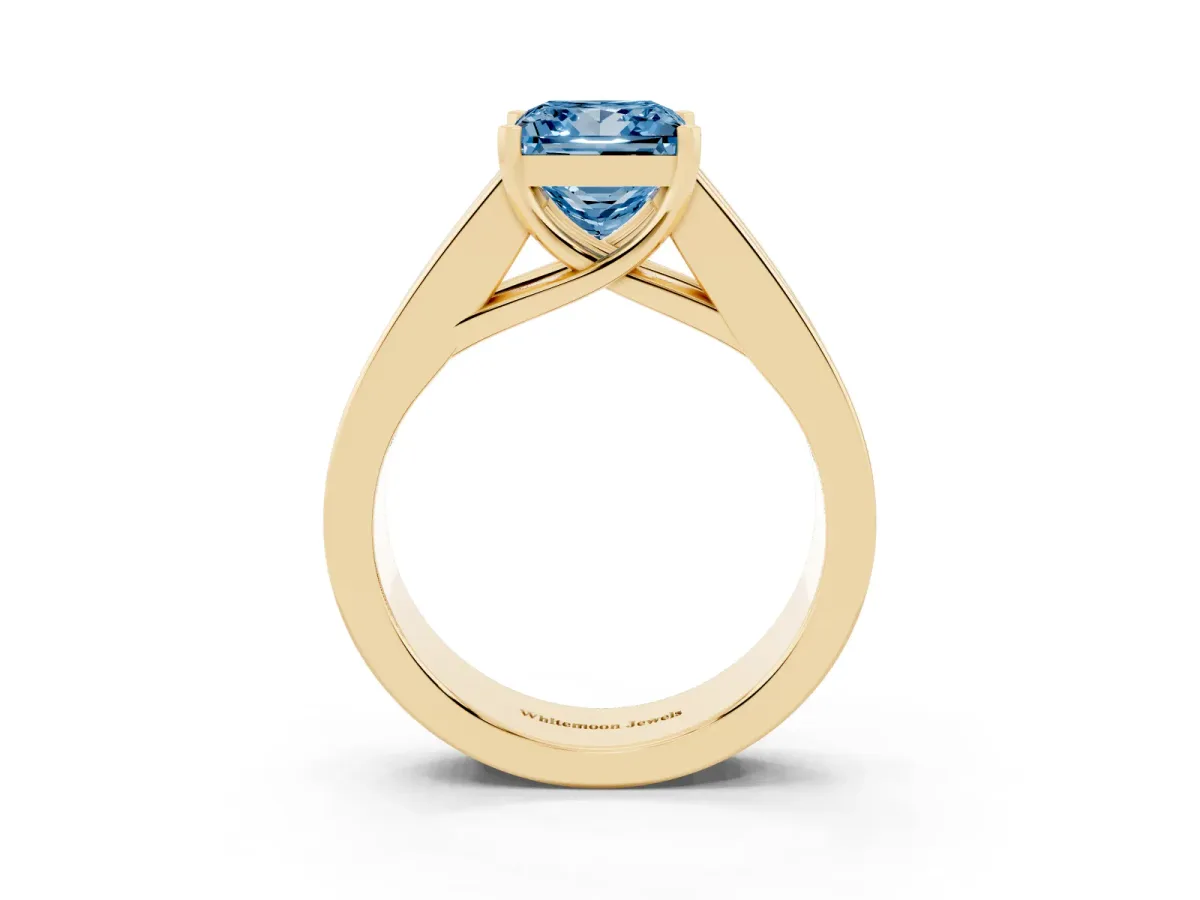 Fancy Blue Princess Cut Cut Channel Set Solitaire Ring with Four-Prong Setting Yellow gold