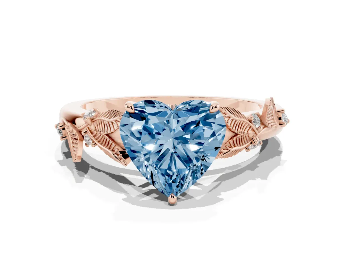 Fancy Blue Heart Cut Diamond Solitaire Ring with Leaf Motif Band and Four-Prong Setting Rose gold