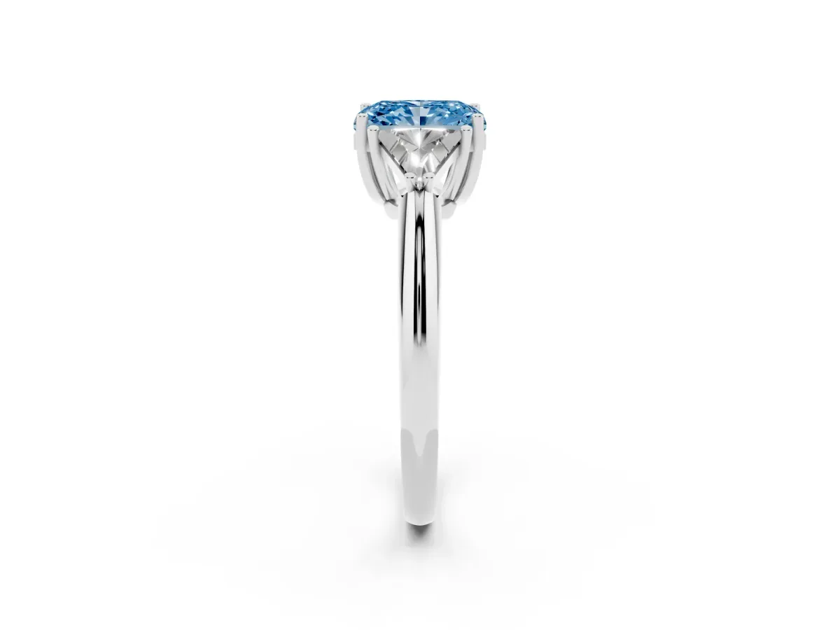 Fancy Blue Three-Stone Radiant Cut Diamond Engagement Ring with Trillion Side Stones and Prong Setting Silver