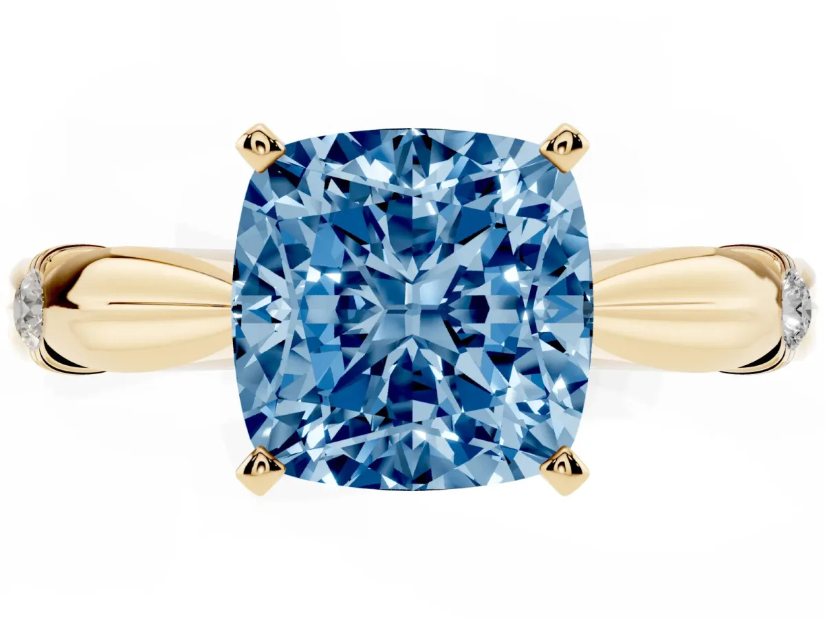 Fancy Blue Cushion Cut Solitaire Diamond Twisted Band with Four-Prong Setting Yellow gold