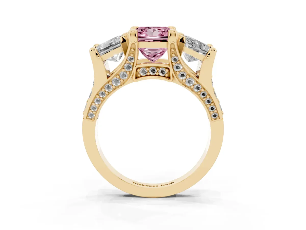 Fancy Pink Princess Cut Diamond Three-Stone Ring with Channel Set Band and Four-Prong Setting Yellow gold