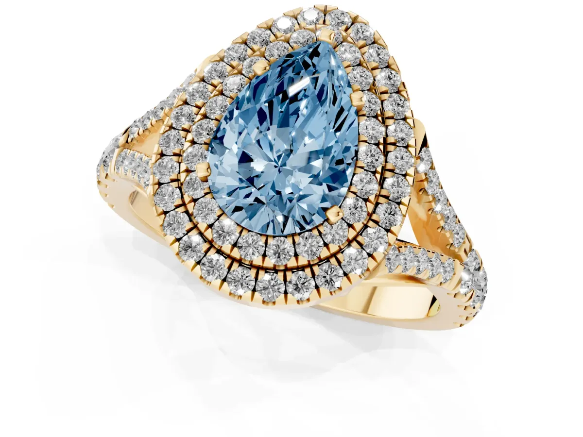 Fancy Blue Pear Cut Diamond Double Halo Ring with Split Shank and Prong Setting Yellow gold