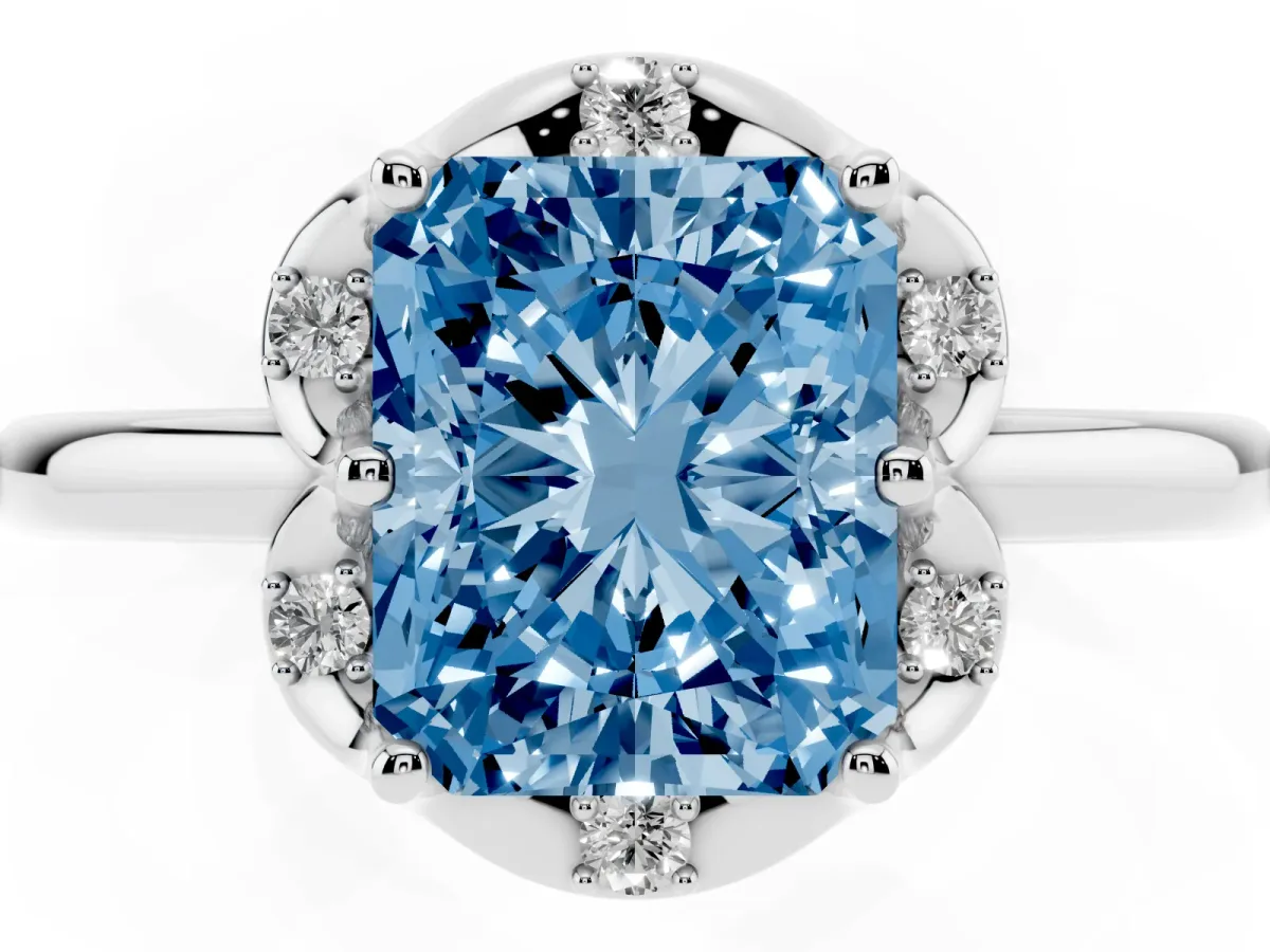 Fancy Blue Radiant Cut Halo Diamond Ring with Round Cluster Setting, Solitaire Band, and Four-Prong Setting Platinum