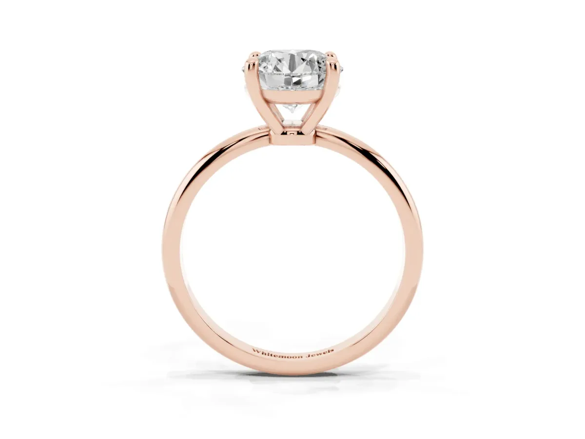 Round Cut Solitaire Diamond Ring with 4-Prong Setting on a Classic Band Rose gold