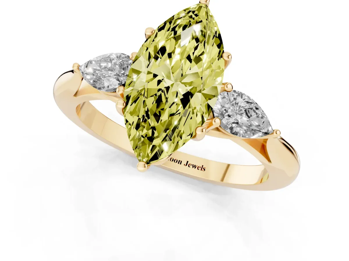 Fancy Yellow Marquise Cut Diamond Three-Stone Ring with Pear Side Stones and Prong Setting Yellow gold