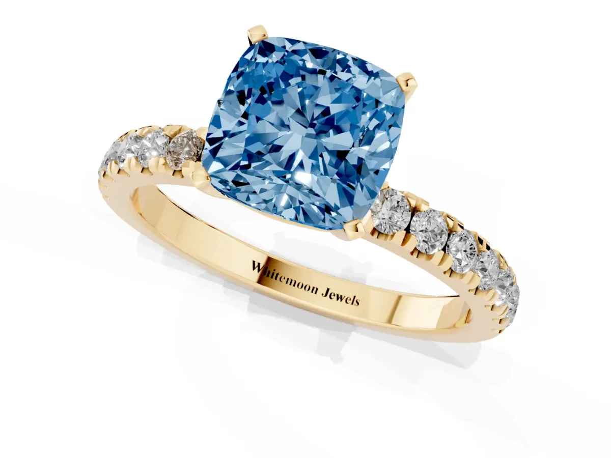 Fancy Blue Cushion Cut Diamond Solitaire Ring with Pavé Accents and Four-Prong Setting Yellow gold