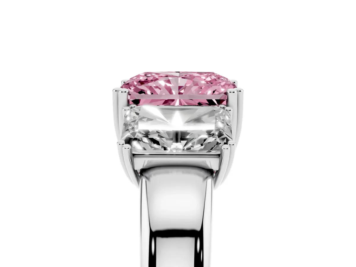 Fancy Pink Three-Stone Radiant Cut Cut Diamond Ring with Channel Set Band and Four-Prong Setting Platinum