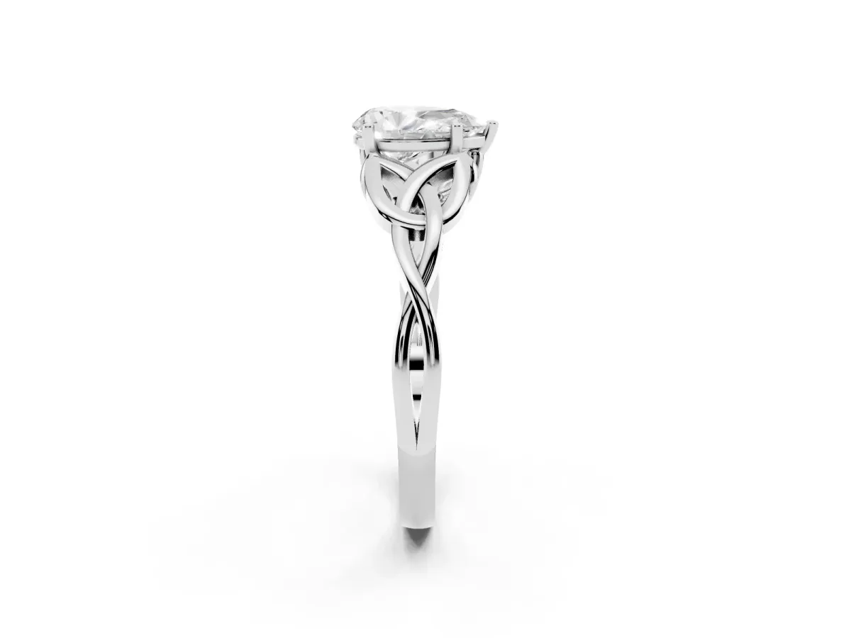 Pear Cut Diamond Solitaire Engagement Ring with Celtic Knot Band and Four-Prong Setting White gold