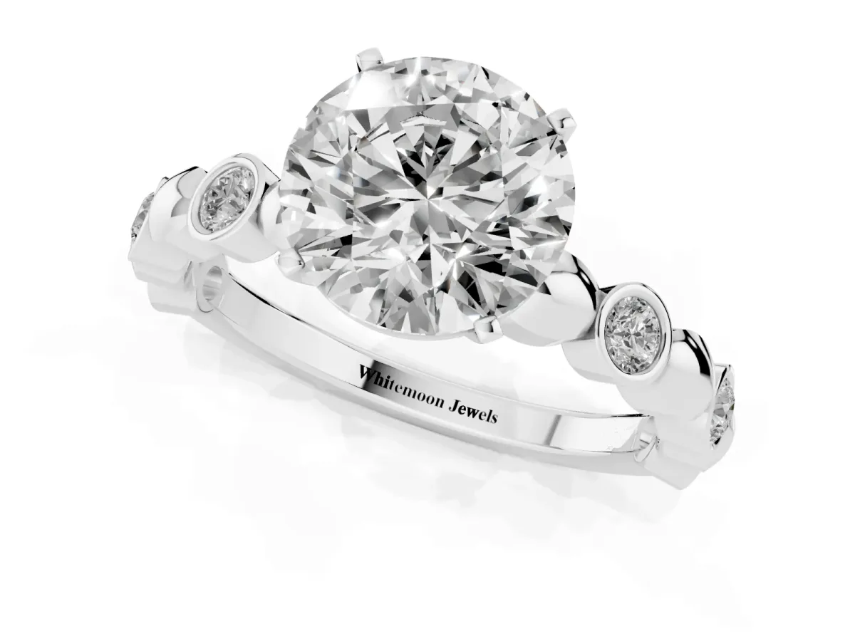 Round Cut Solitaire Bezel-Set Diamond Ring with Beaded Band and Four-Prong Setting Silver