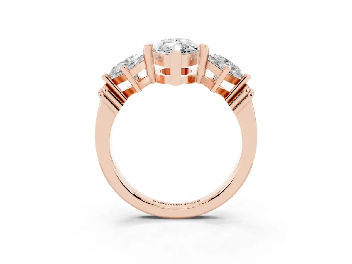 Three-Stone Marquise Cut and Princess Cut Diamond Ring with Channel Band and Four-Prong Setting Rose gold