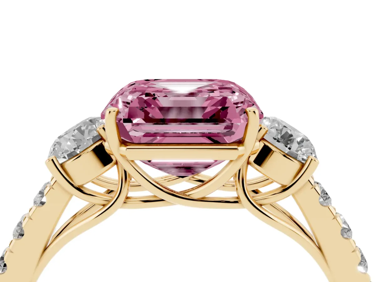 Fancy Pink Asscher Cut Cut Diamond Three-Stone Ring with Round Side Stones and Pavé Band Yellow gold