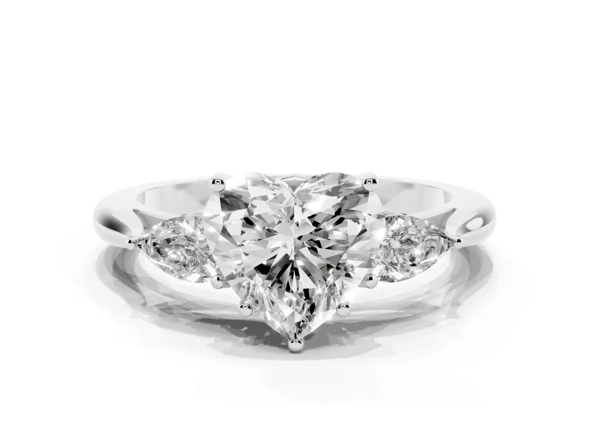 Three-Stone Heart Cut Brilliant Diamond Solitaire Ring with Tapered Band and Four-Prong Setting Silver