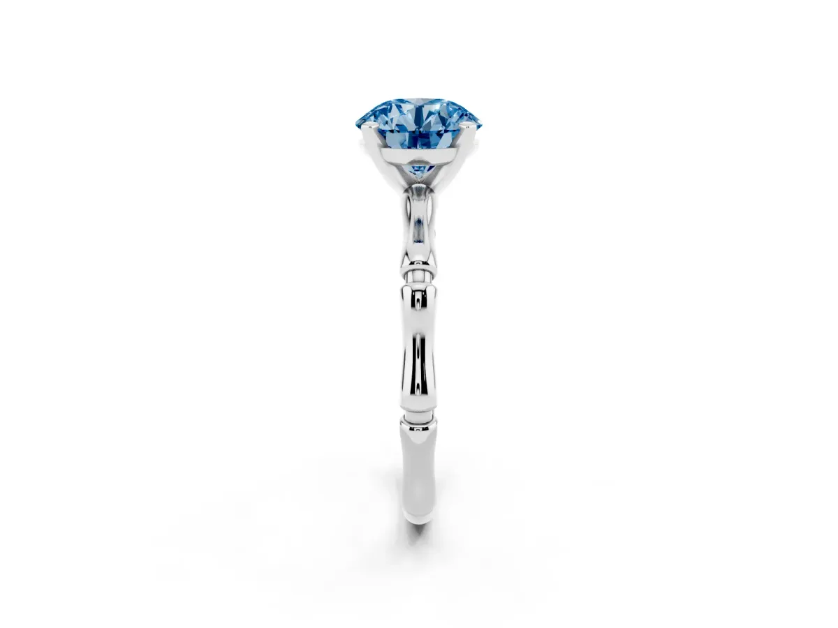Fancy Blue Round Cut Solitaire Diamond Ring with Bamboo Band and Four-Prong Setting Silver
