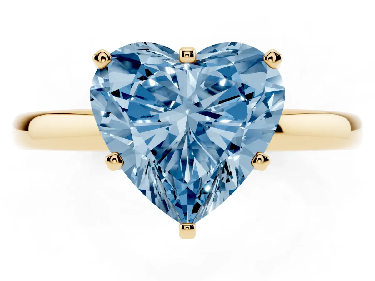 Fancy Blue Heart Cut Solitaire Diamond Ring with Six-Prong Setting on a Classic Band Yellow gold