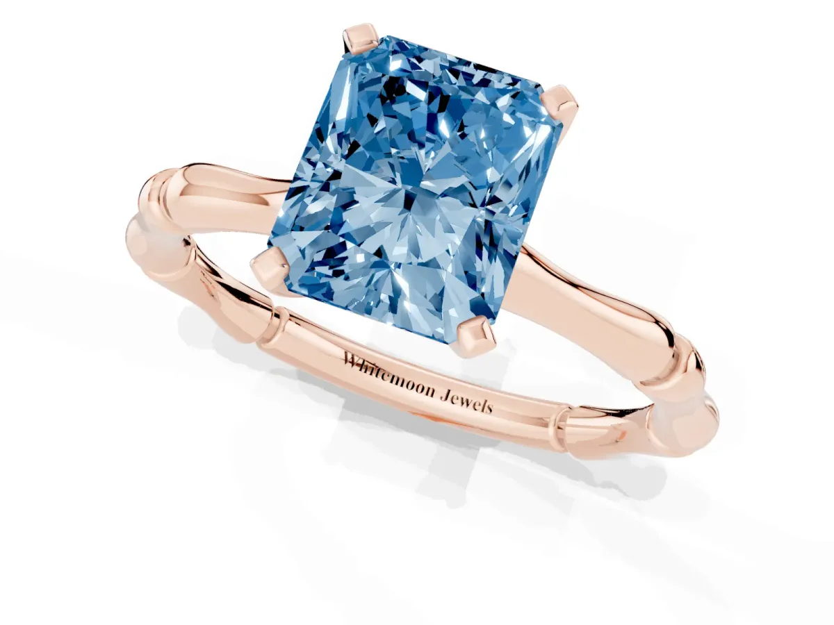 Fancy Blue Radiant Cut Solitaire Diamond Ring with Bamboo Band and Four-Prong Setting Rose gold