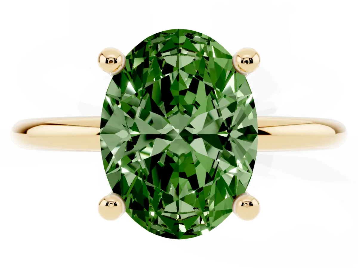 Fancy Green Oval Cut Solitaire Diamond Ring with 4-Prong Setting on a Classic Band Yellow gold