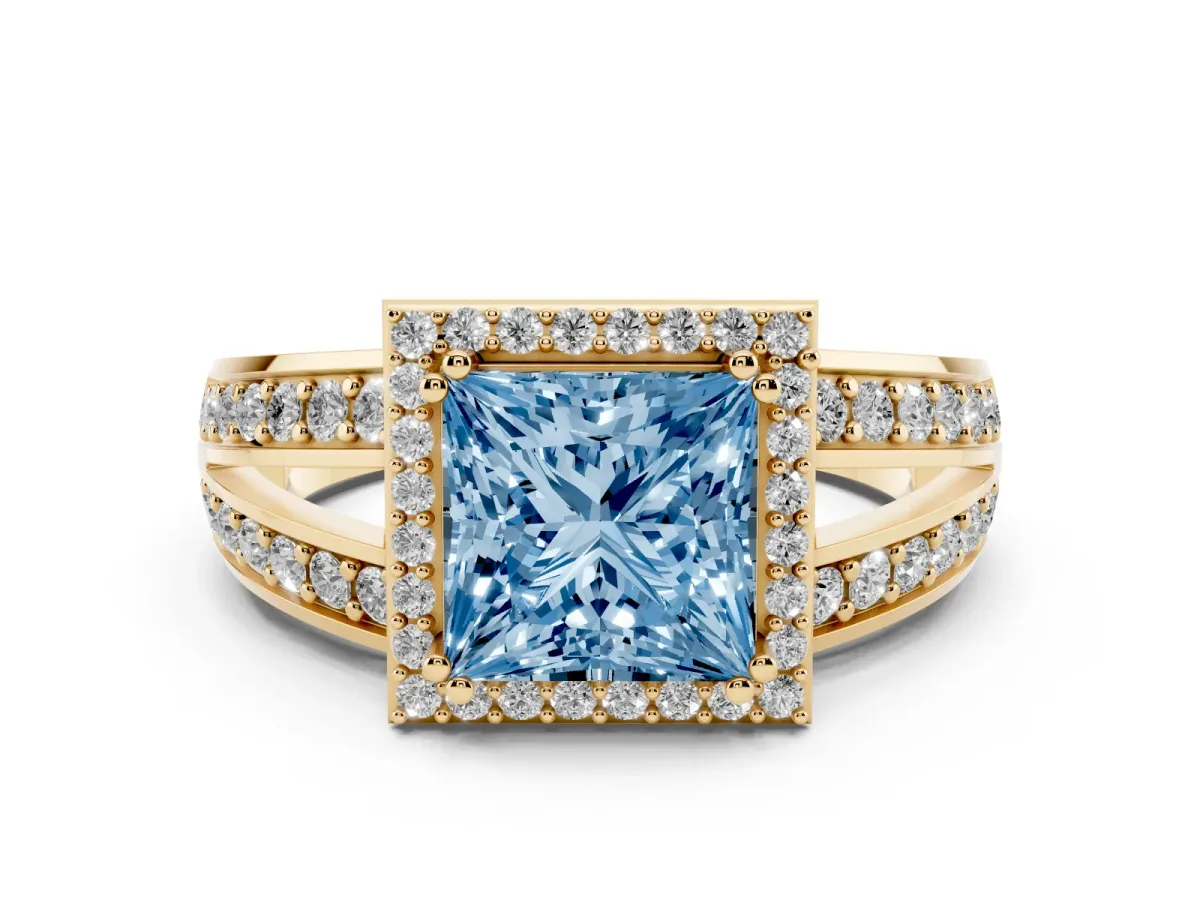 Fancy Blue Princess Cut Diamond Halo Ring with Split Shank Pavé Band and Four-Prong Setting Yellow gold