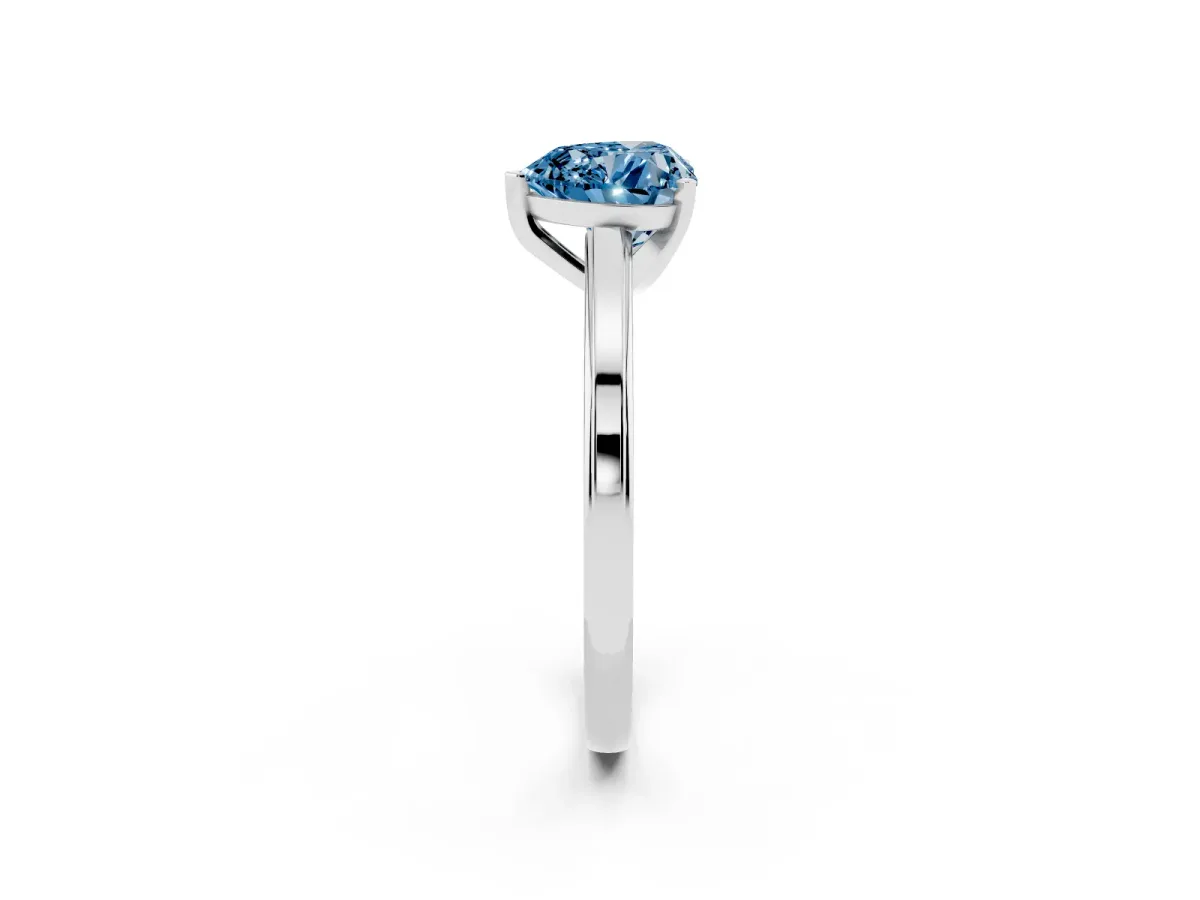 Fancy Blue Heart Cut Solitaire Diamond Ring with Four-Prong Setting and Classic Band Platinum