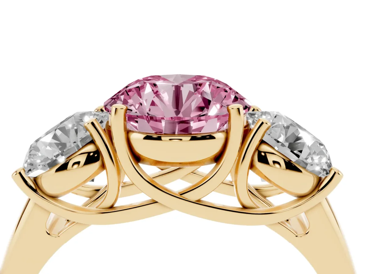 Fancy Pink Three-Stone Round Cut Diamond Engagement Ring with Prong Setting Yellow gold