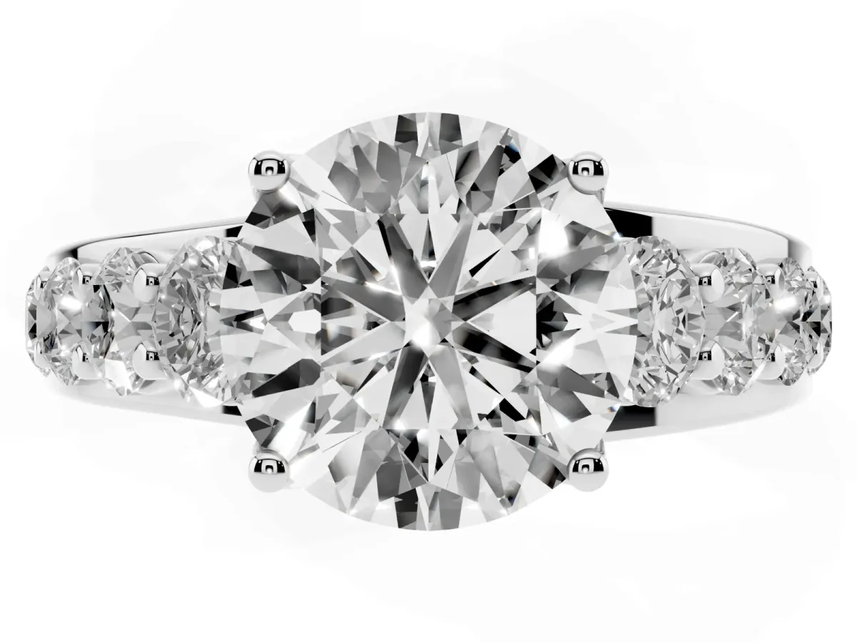 Round Cut Diamond Engagement Ring with Pavé Band and Four-Prong Setting Silver