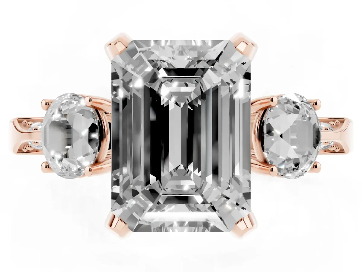 Emerald Cut Brilliant Three-Stone Diamond Ring with Pavé Band and Four-Prong Setting Rose gold