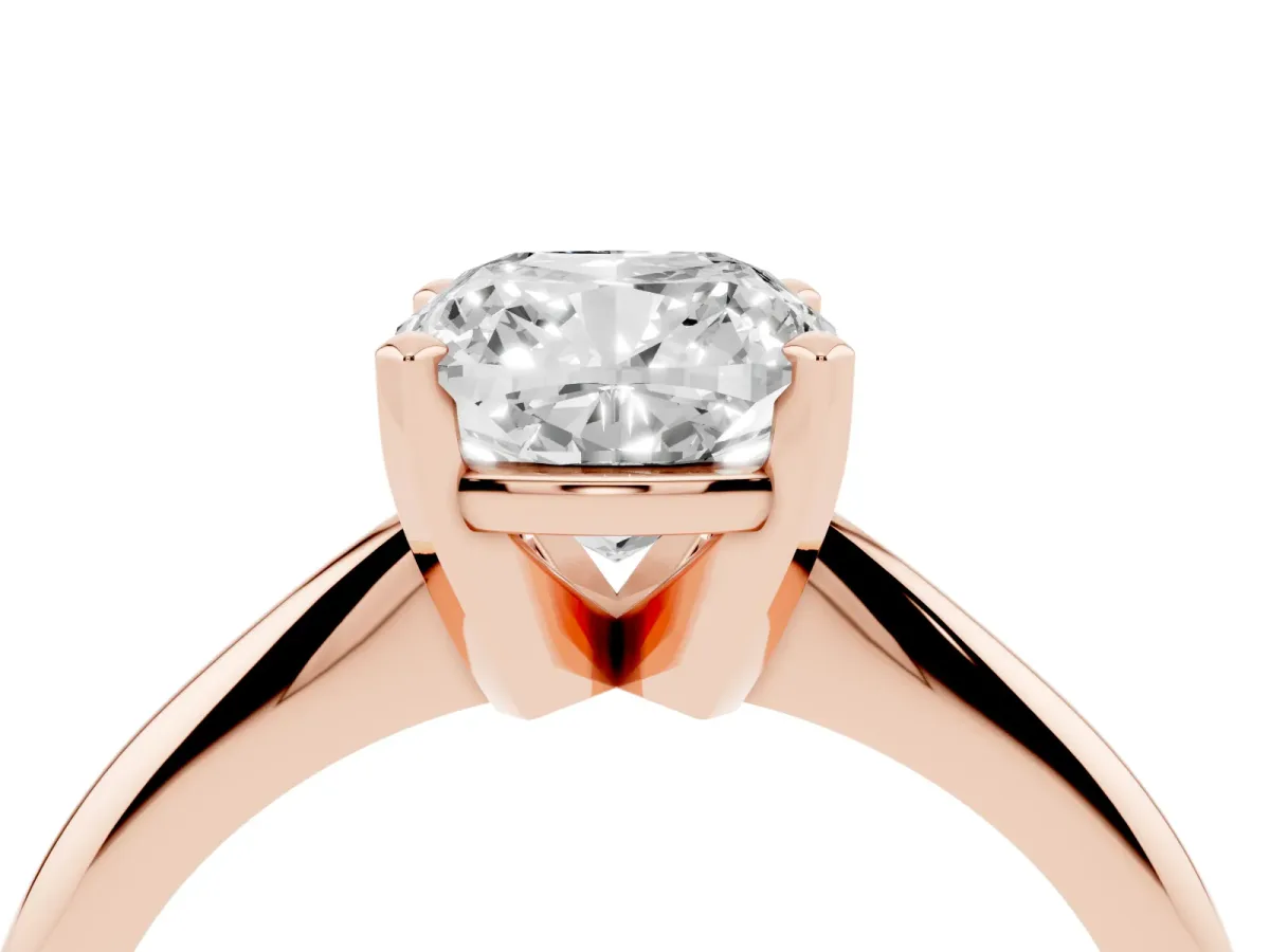 Cushion Cut Cut Solitaire Ring with Four-Prong Setting on a Classic Band Rose gold