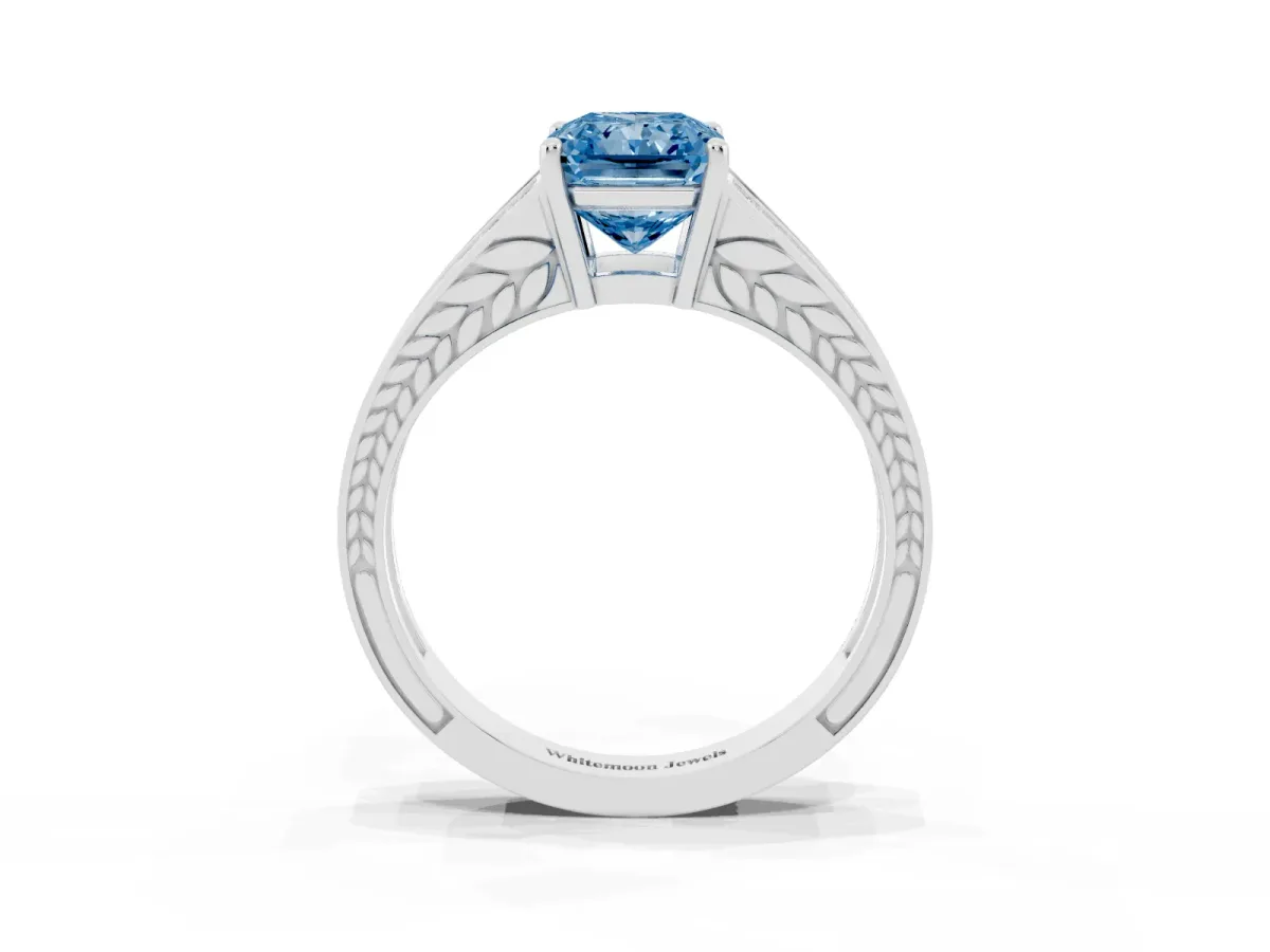 Fancy Blue Radiant Cut Diamond Split Shank Ring with Pavé Band and Four-Prong Setting White gold